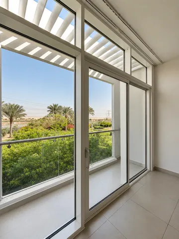 Corner sliding glass doors under the pergola, Arabella Townhouses