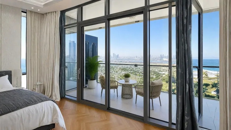 Balcony terrace through the lift and slide door, Burj Daman