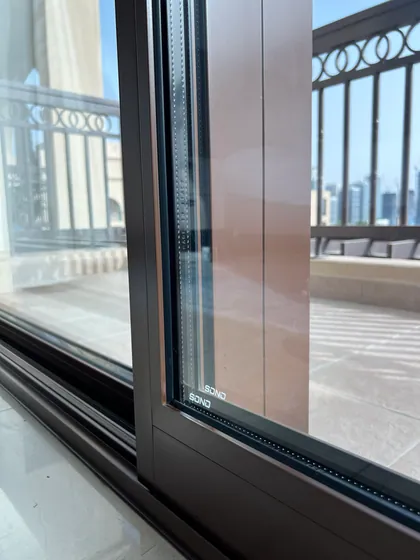 SONO double-glazed sliding door frame detail, Fairmont Palm balcony