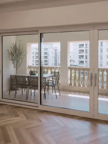New sliding balcony doors, Golden Mile 3 apartment