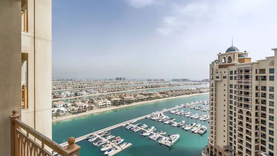 Palm Jumeirah marina with moored yachts, Marina Residences