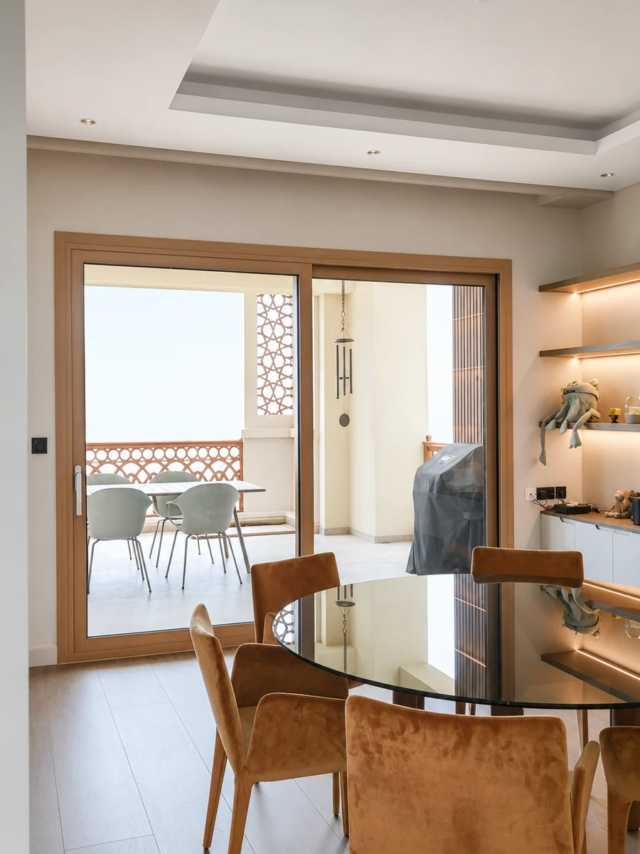 Dining area with timber-finish sliding door, Marina Residence 4